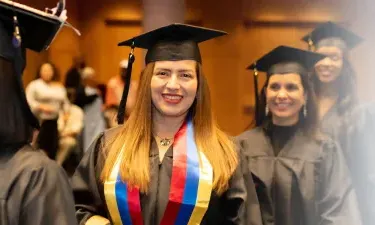 Herzing South Carolina Online BSN Student Smiling at Graduation Ceremony